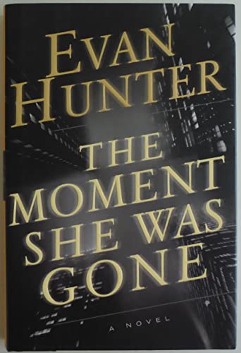 cover image THE MOMENT SHE WAS GONE