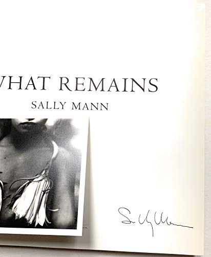 cover image WHAT REMAINS